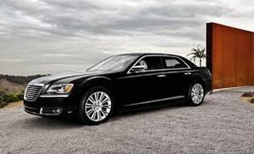 crown prestige limousines chauffeured corporate transfer, driver welcoming clients